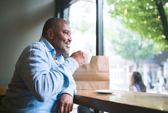 man drinking coffee